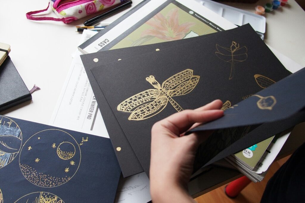 gold painted set design — Hand-painted gold scenery. With a dragonfly